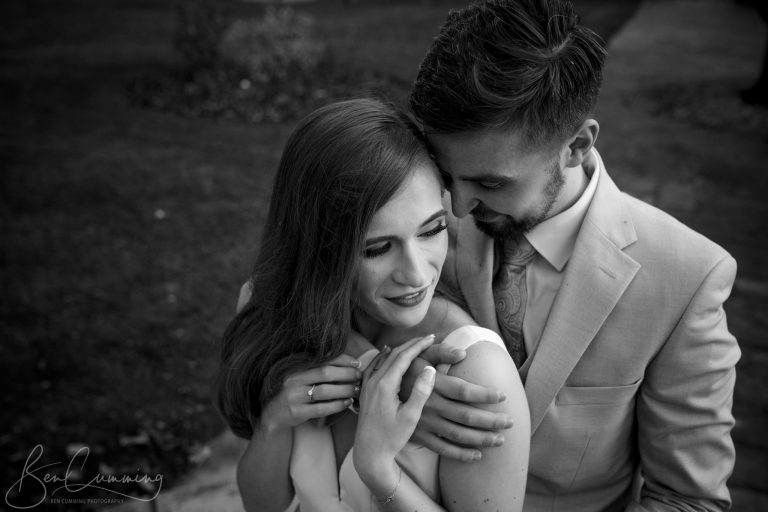 Bride and Groom cuddle