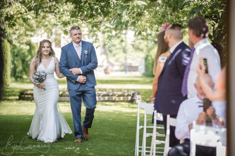 Bride and Father of the Bride walking to the Ceremony at Hazlewood Castle