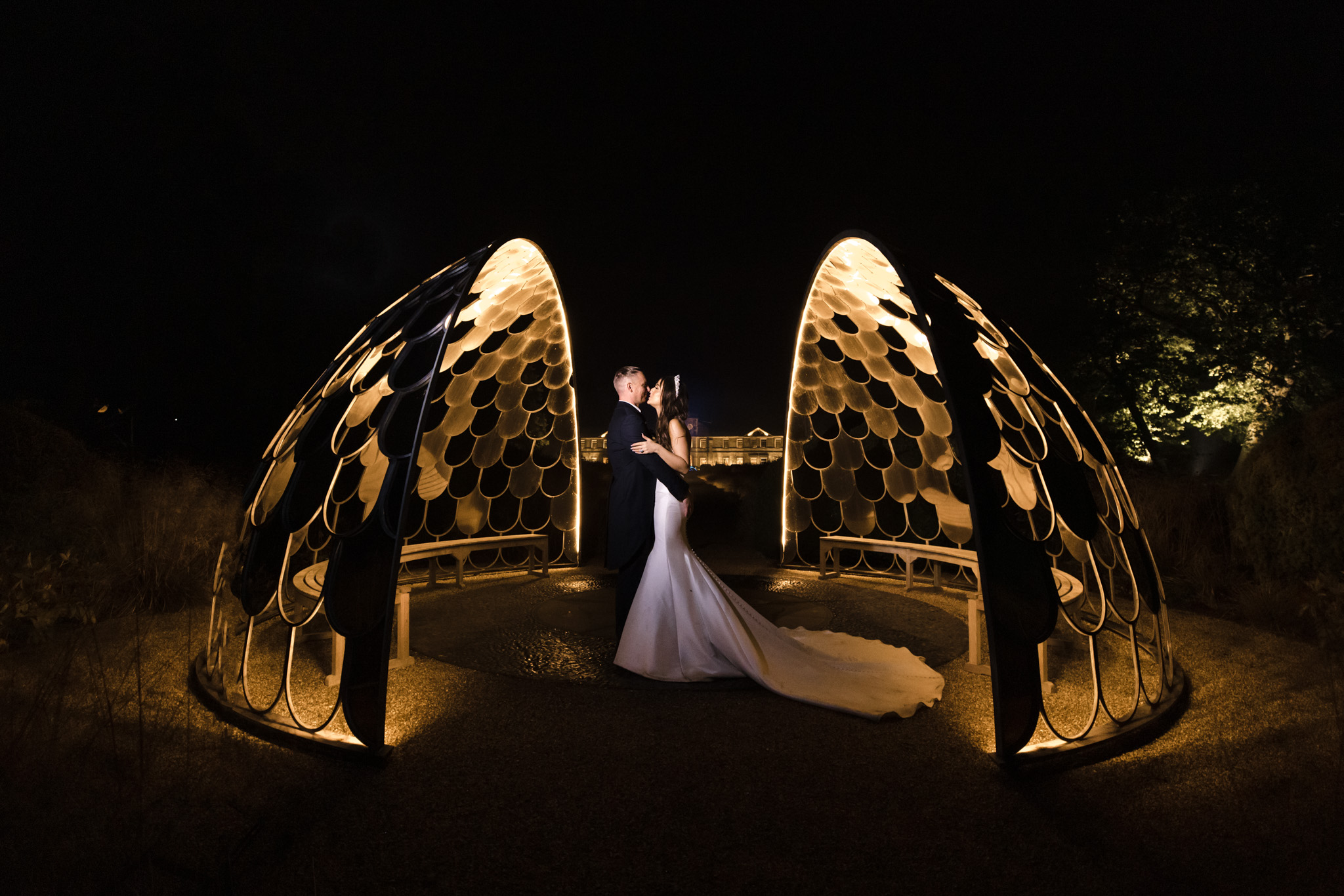 A night photoof the bride and groom at Grantley Hall